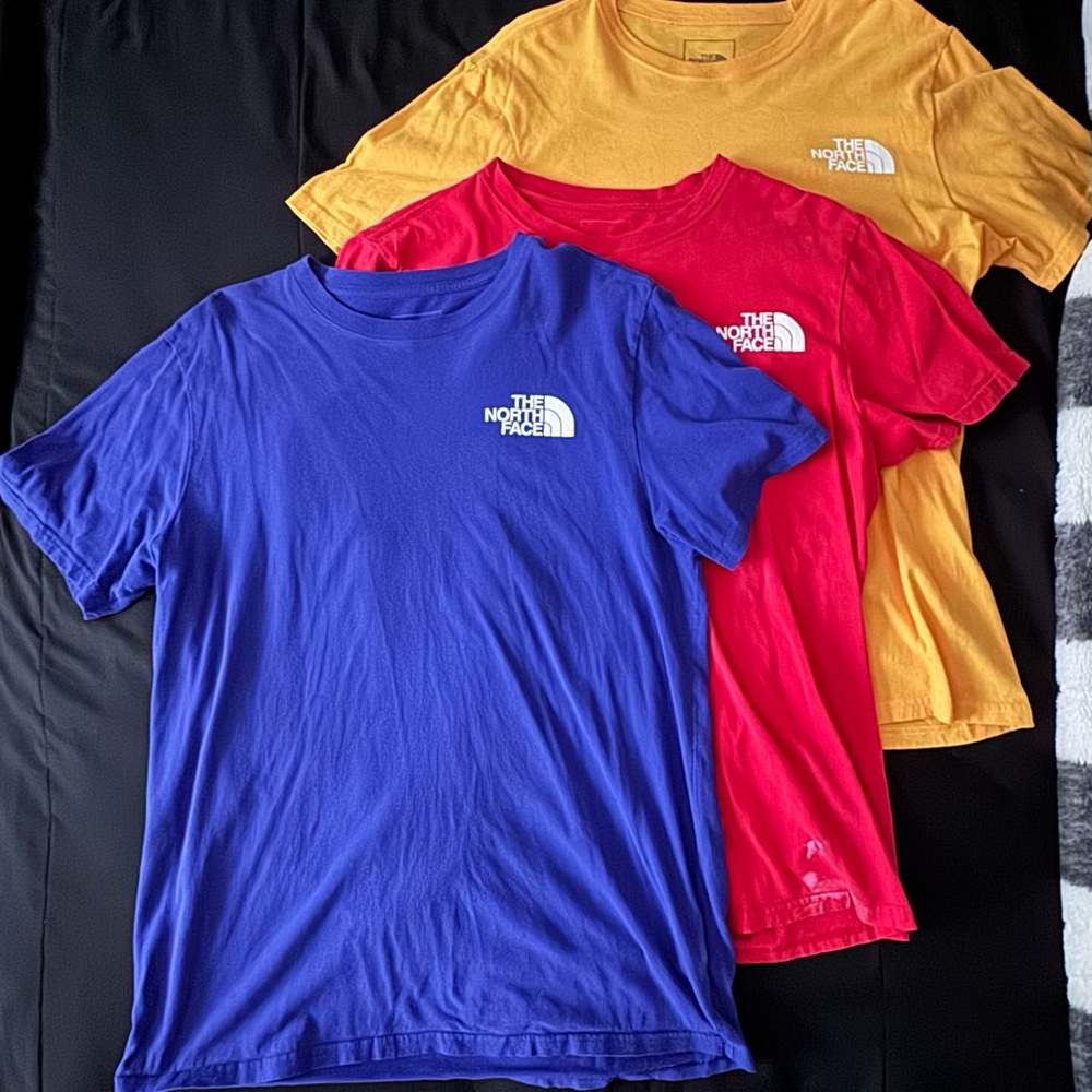 The North Face T-Shirts in Blue, Red, and Yellow Medium